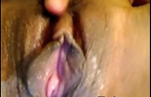 Asian girl masturbating with dildo on webcam